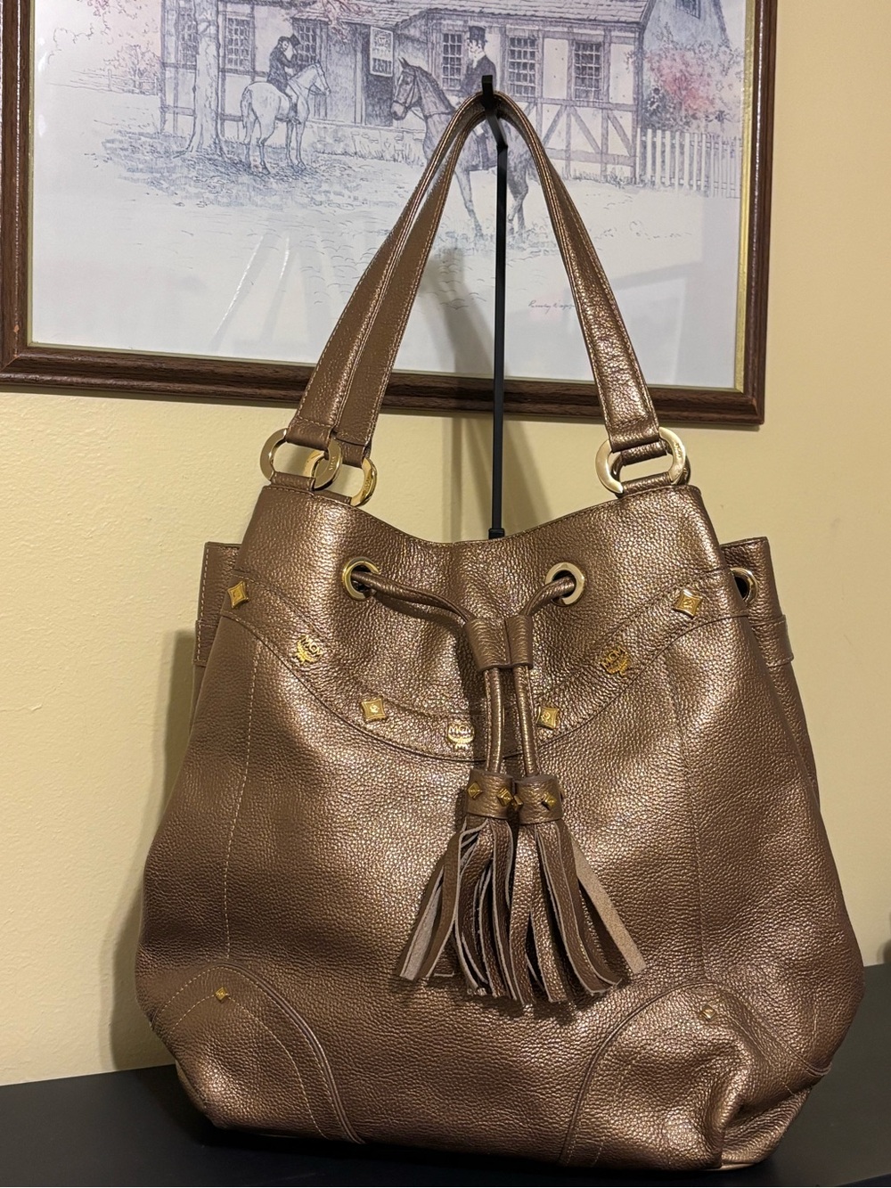 MCM Metallic Bronze Tassel Drawstring Bucket Bag